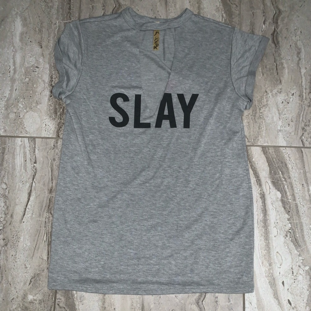 Grey SLAY dress with V cut in the middle 
Size:M